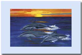 three dolphins jumping in the ocean at sunset