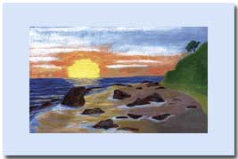 beach at low tide with the sun setting