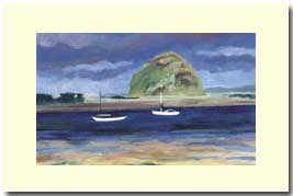 sailboats in front of moro bay rock